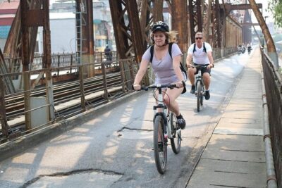 Bicycle Tour Full Day Explore Red River Delta & Rural Villages - Long Bien Bridge: city alleyways to river-crossing perspective