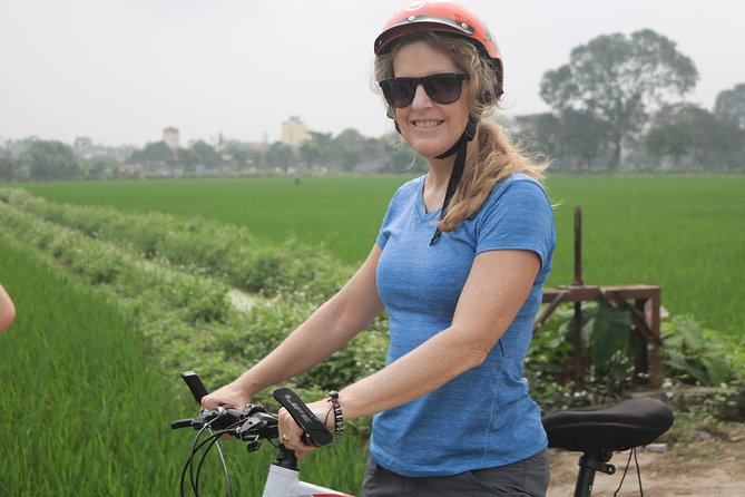 Bicycle Tour Full Day Explore Red River Delta & Rural Villages - Local family visit: tropical fruit and real conversation time