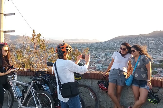 Bicycle Tour through Oaxaca learning about its Urban Art and History - Cerro del Fortín: city panoramas plus a Juárez pass-by