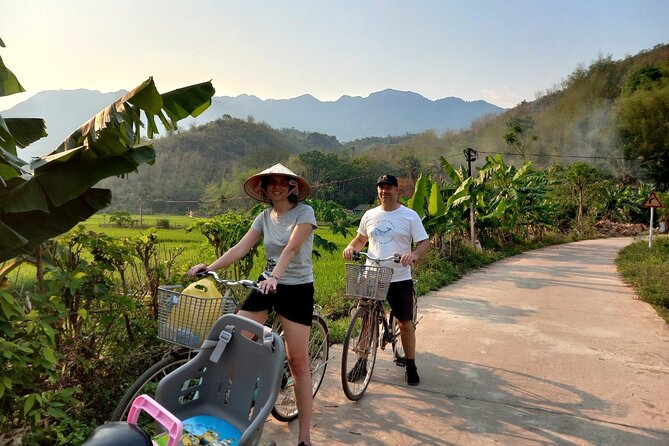 Full-Day Cycling & Handcraft Workshop in Mai Chau Valley - Stop 1 in Mai Chau: rice fields, stilt houses, and a calm village pace