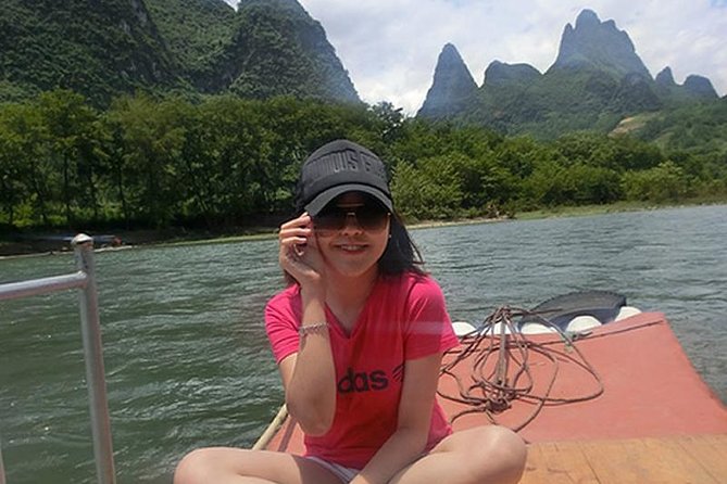 Full-day Tour: Cycling, Rafting & SanjieLiu Outdoor Water Theatre - Bamboo Rafting on the Yulong River: A Different View of Guilin’s Signature Hills