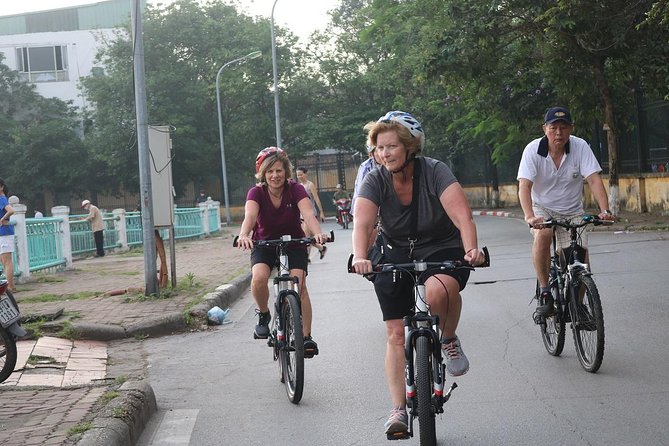 Half-Day Bicycle Tour Combine City & Countryside + Train Street - Long Bien Bridge: a 1902 landmark crossing with big views