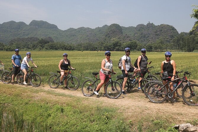 Hoa Lu - Tam Coc - Mua Cave 1 Day with Cycling, Hiking, Lunch - Activity level: cycling, boating, and a stair-heavy finale
