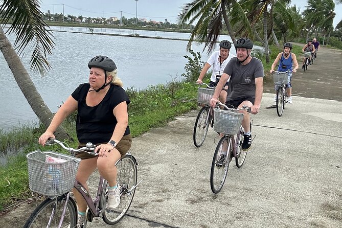 Hoi An countryside cycling Tour,Basket Boat-organic farming-lunch - Bay Mau coconut forest: coconut water, crab fishing, and basket boats