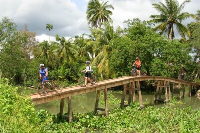 Mekong delta cycling tour 3 days - Day 1 from Long An fruit farms to Cai Be sunset boats