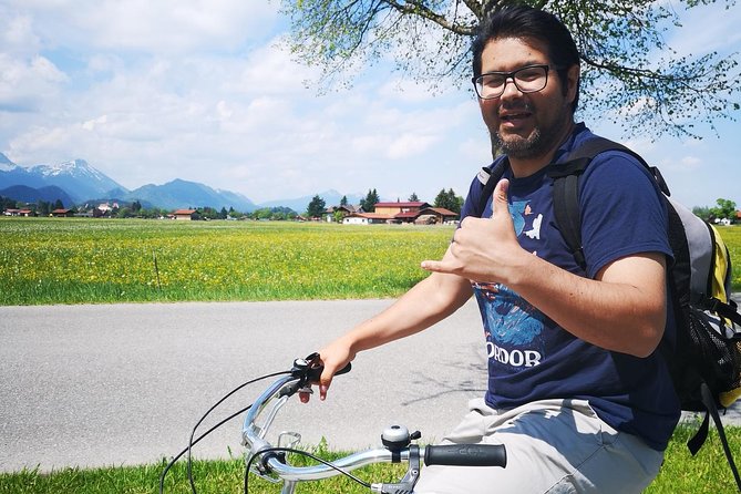 Neuschwanstein Castle by Bus Incl. Bike Ride or Hohenschwangau - Schwansee and the lake break: photos, optional swims, and a scenic reset