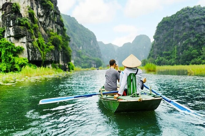 Ninh Binh Full-Day Tour Hoa Lu Tam Coc Cycling, Boat,Buffet Lunch - Tam Coc caves by boat: three stops, two-person boats