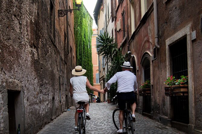 Rome : E-Bike on the Tiber, Family Tour (95% Cycle Path) - Stop 2: Isola Tiberina—quiet break in the middle of the river