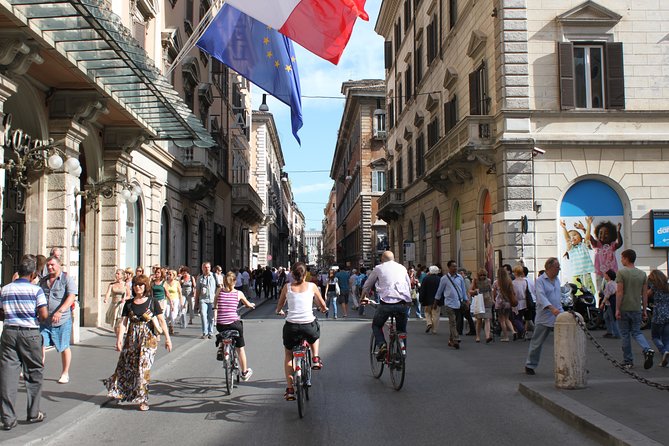 Rome Highlights Bike Tour 3 Hour City Cycling Experience - The painter-street vibe and Piazza del Popolo’s classic center energy
