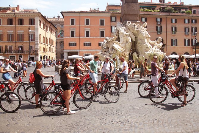 Rome Highlights Bike Tour 3 Hour City Cycling Experience - Palazzo di Montecitorio: Parliament power in a baroque shell
