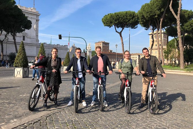 Rome Highlights Bike Tour 3 Hour City Cycling Experience - Via Cavour meet-up: getting ready to ride in Rome