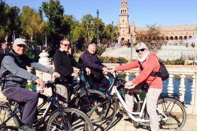 Seville Bike Tour with Full Day Bike Rental - Meeting at C. Trajano, and getting your bike comfortable fast