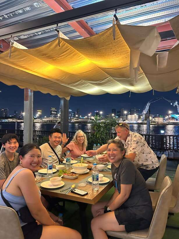 Twilight Firefly Bangkok Bicycle Tour - Dinner by the river: Thai food with Bangkok’s lights across the water