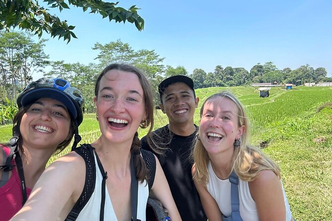 Ubud: Downhill Cycling with Volcano, Rice Terraces and Meal - Manukaya Stop and Community Visits: Local School, Family Compounds, and Temples